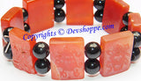 Tibetan Eight Auspicious symbols bracelet in Carnelian