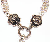 Oxidized flowers in necklace