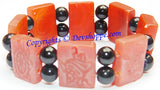 Tibetan Eight Auspicious symbols bracelet in Carnelian